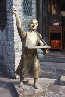 賣貨郎情景小品雕塑批發(fā)